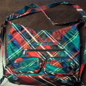 Gently Used Zipliner In Tartan Plaid!